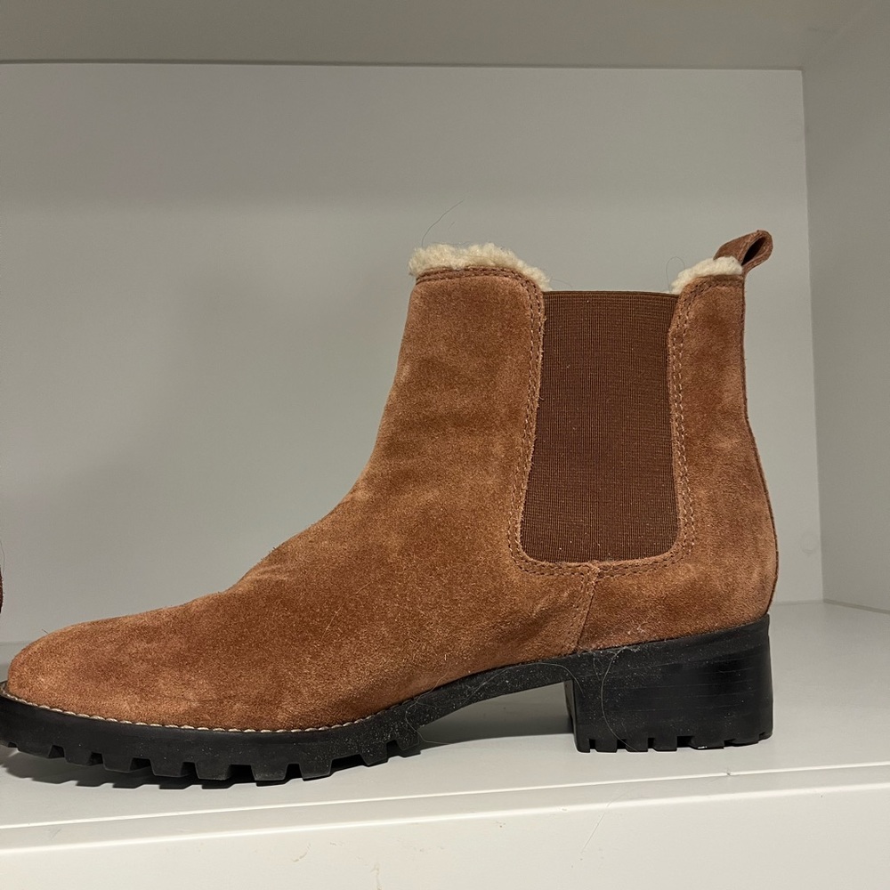 Talbot’s brown suede Chelsea boots.